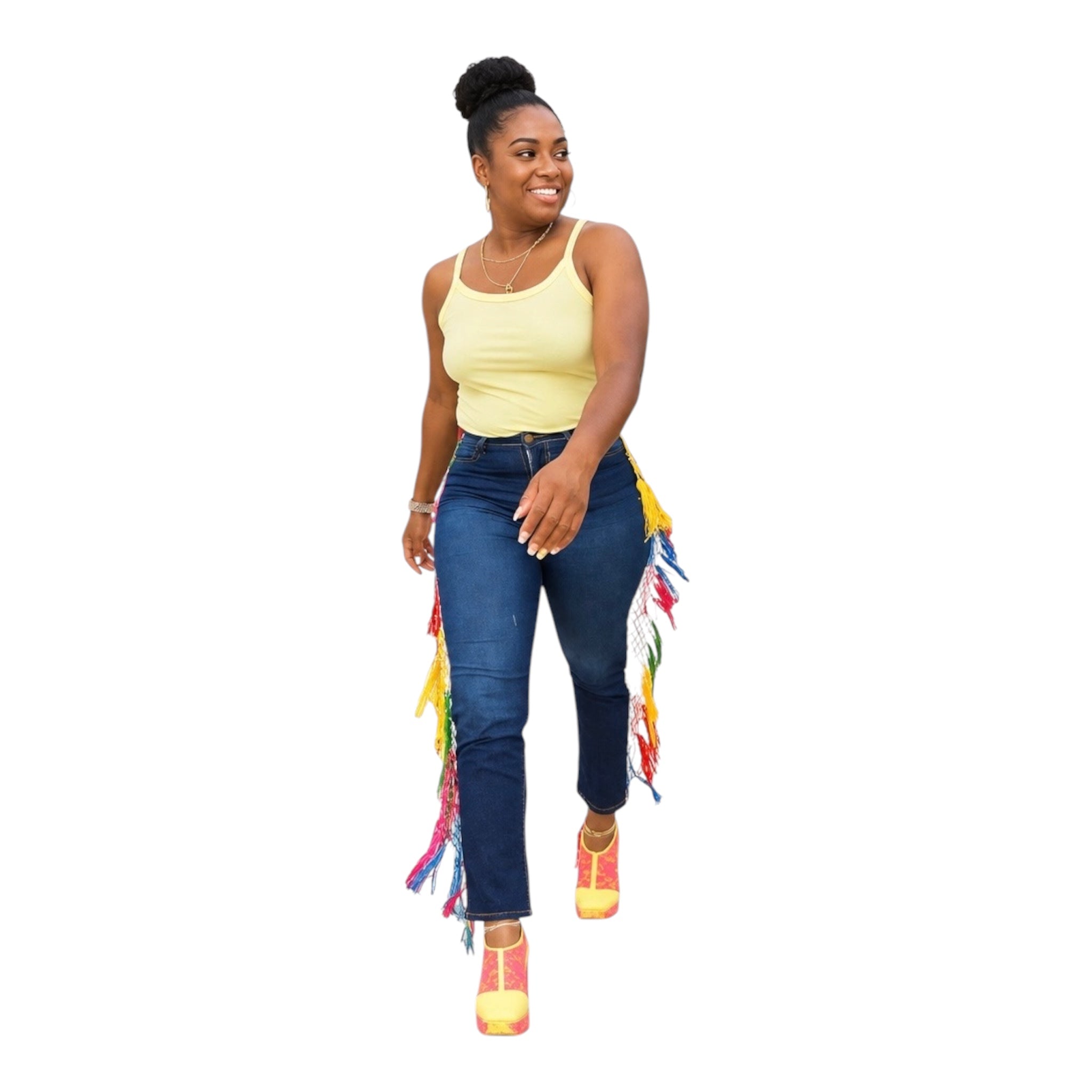 Every step is a statement. The Carnival Fringe Jean in Dark Wash pairs deep indigo denim with a full-length rainbow fringe cascade — bold, intentional, and built for the woman who owns every room she walks into.