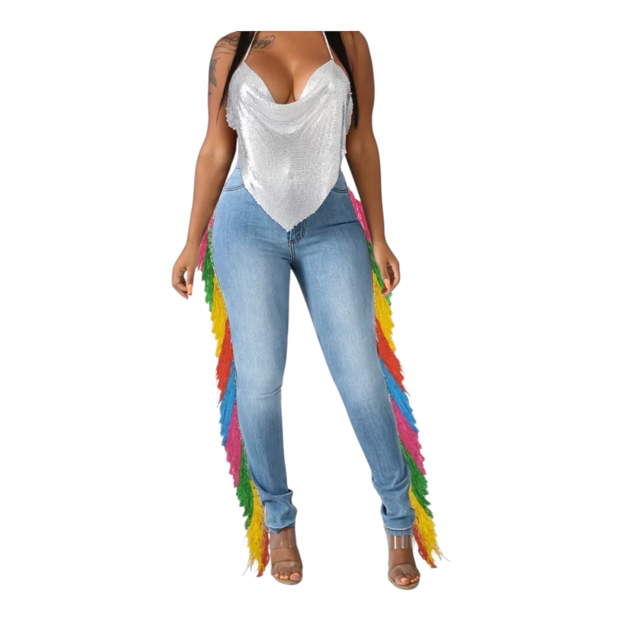 Light denim. Heavy presence. The Carnival Fringe Jean in Light Wash brings sun-washed ease to a full-length rainbow fringe cascade — effortless on the surface, impossible to ignore in person.