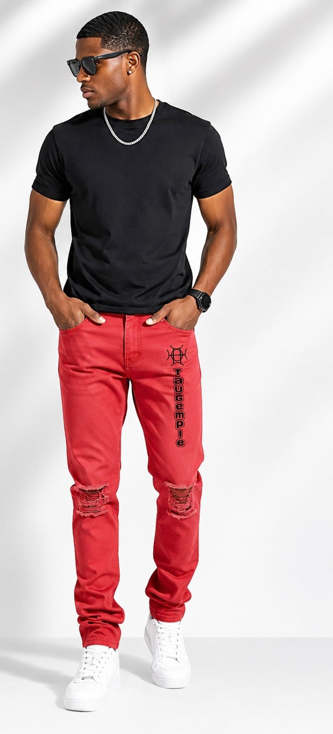 Not for the hesitant. Crimson Discipline Denim is a full statement — bold red colorway, distressed knees, and the TAUGEMPIE mark for the man who dresses with conviction.