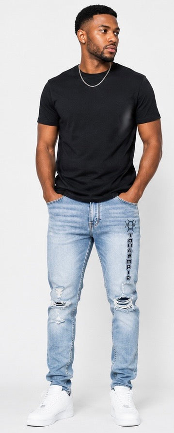 The original, reimagined. Indigo Discipline Denim brings classic blue denim into TAUGEMPIE’s world — slim fit, branded logo, distressed knees, and a stretch blend that moves with purpose.