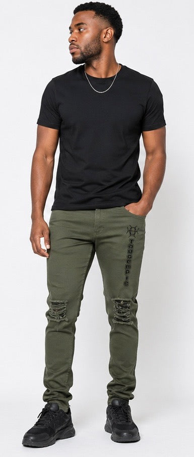 Built for the field and the culture. Terrain Discipline Denim channels military heritage into elevated streetwear — army green, distressed detail, and the TAUGEMPIE mark for the man who moves with purpose.
