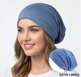 The Satin Crown Beanie in Cobalt is confidence you can wear. A deep, saturated true blue exterior in a 90% cotton and 10% spandex blend — soft against your skin, smooth satin against your hair — designed for the person who never does anything halfway.

