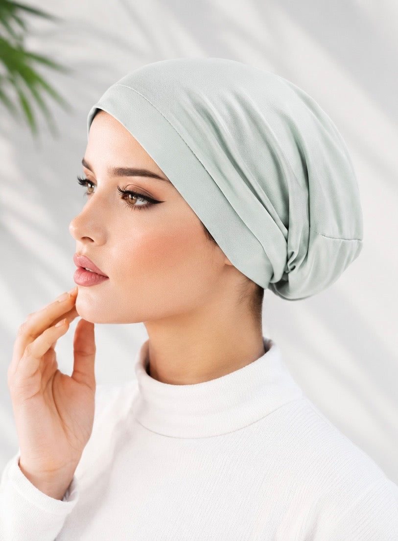 Grounded and refined. The Sage Satin Crown Beanie brings earthy, elevated energy to your everyday — satin-lined for hair protection, soft cotton blend for all-day comfort.
