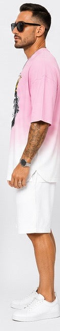 Kings don’t blend in. The Crown Set is a full cultural moment — pink-to-white gradient, crowned gorilla graphic, and clean white shorts for the man who wears confidence like a uniform.
