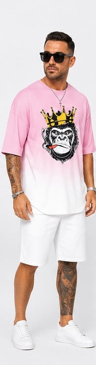 Kings don’t blend in. The Crown Set is a full cultural moment — pink-to-white gradient, crowned gorilla graphic, and clean white shorts for the man who wears confidence like a uniform.
