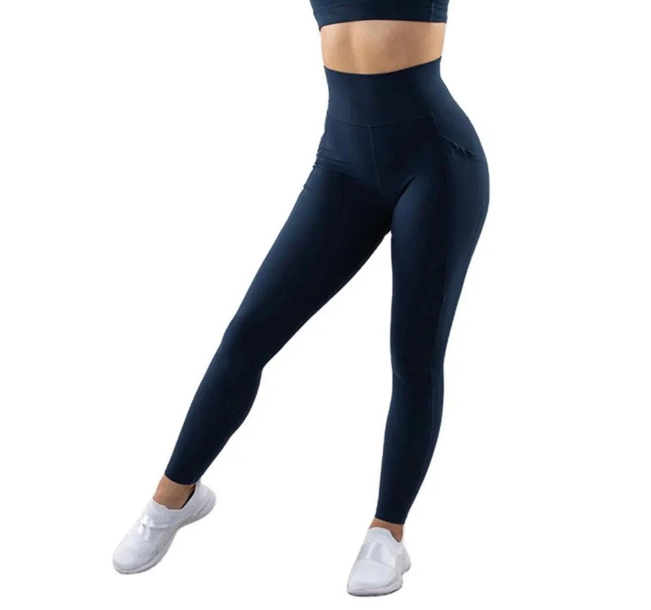 Bold and built to perform. The Discipline Legging in Blue brings rich cobalt energy to high-waist compression — side phone pocket, waist card pocket, and a silhouette that holds its shape all day.