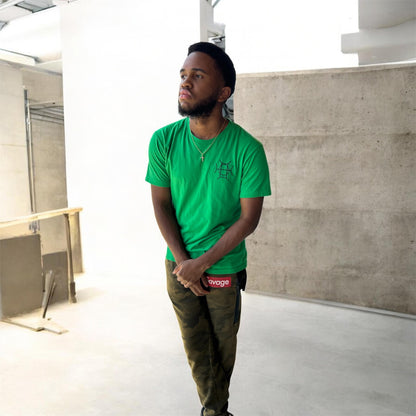 The Mark Crew in Green is the piece for who moves with purpose. A rich kelly green 100% cotton crewneck carries the TAUGEMPIE crest mark on the left chest and the full signature logo graphic across the back — clean on the front, statement on the back.
