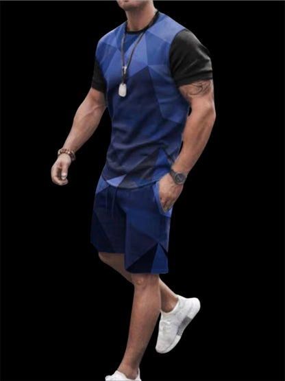 The Prism Set is built for the man who moves with purpose. A bold geometric diamond print in deep navy and black covers a fitted crewneck tee — structured, angular, and unmistakably intentional. Paired with clean navy shorts that ground the look with simplicity.