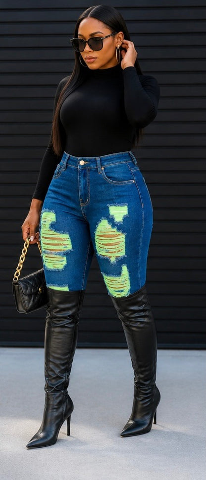 The Voltage Shredded Jean in Green is controlled chaos — in the best way. Neon green accent stitching electrifies deliberately shredded distress points, creating a look that balances edge with attitude and street with elevation.